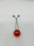 Red pearl hijab pull pin for securing scarves and hijabs, elegant modest fashion accessory with decorative pearl bead for Muslim women headscarves.