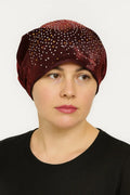 Red rhinestone bun turban cap for women with sparkling crystal rhinestones on soft stretch fabric. Modest hijab headwear with built-in bun design for elegant styling, comfortable slip-on turban cap for prayer, everyday wear, special occasions, and modest fashion outfits.