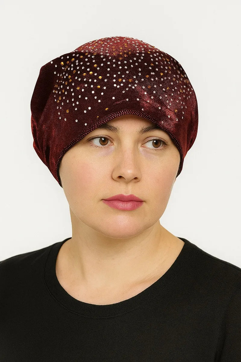 Red rhinestone bun turban cap for women with sparkling crystal rhinestones on soft stretch fabric. Modest hijab headwear with built-in bun design for elegant styling, comfortable slip-on turban cap for prayer, everyday wear, special occasions, and modest fashion outfits.