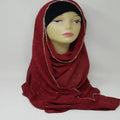 Red rhinestone hijab scarf draped on mannequin soft fabric modest headscarf with sparkling rhinestone detail elegant Muslim women fashion wrap shawl full coverage hijab for daily wear and special occasions breathable fabric smooth finish lightweight modest wear accessory