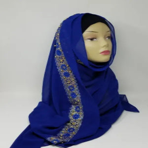 royal blue hijab scarf with gold edge trim soft modest headscarf for women full coverage smooth fabric elegant bright blue hijab modest fashion wrap
