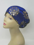 Royal blue gold patterned turban for women with shimmer detail, soft stretch fabric head covering, ready to wear turban headwear, full coverage modest headwear, lightweight breathable turban, slip on hijab alternative, elegant blue gold turban for women, comfortable daily wear head covering, stylish patterned turban