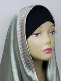 Silver satin hijab scarf with delicate lace trim and rhinestone detailing along the edge, elegant modest fashion headscarf with smooth satin fabric drape designed for everyday wear, formal events, and stylish hijab outfits.