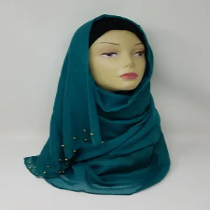 teal hijab scarf with gold bead detailing soft fabric modest fashion head covering elegant full coverage style for women lightweight comfortable drape for everyday and special occasions