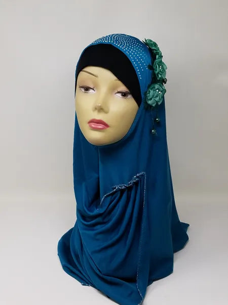 Teal rhinestone khimar hijab with decorative floral rhinestone side detail, elegant modest Islamic head covering for women, full coverage one piece khimar from Affordable Hijab USA suitable for prayer and everyday modest fashion.