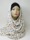 White floral print hijab scarf for Muslim women, lightweight modest headscarf with delicate floral pattern, elegant draped hijab for everyday wear, prayer, work, and modest fashion styling