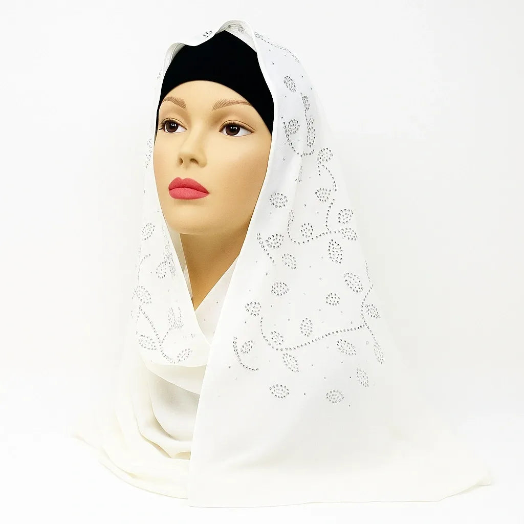 White chiffon hijab with rhinestone embellishments, elegant modest Muslim headscarf made from lightweight flowing fabric for special occasions and stylish everyday wear.