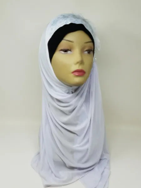 White khimar hijab with rhinestone flower detail on the side, one piece modest Muslim head covering draping over shoulders, elegant Islamic khimar hijab for prayer and everyday wear